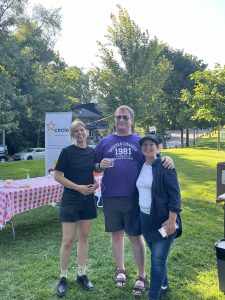 Circle staff member and tenants smiling