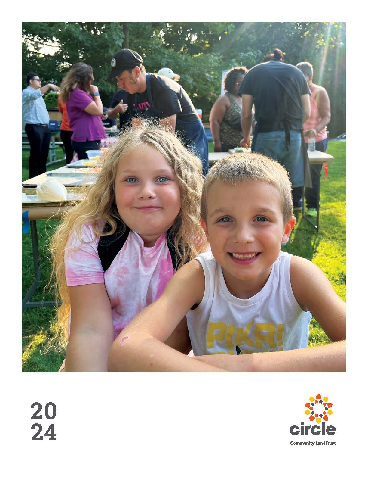 Cover page of the 2022 Annual Report, showing an illustration of a sun rising over houses.
